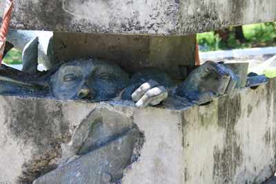 026 IMG_6839  The statue of former dictator Alfredo Strossener was crushed and placed in a concrete block with only his hands and face protruding.jpg